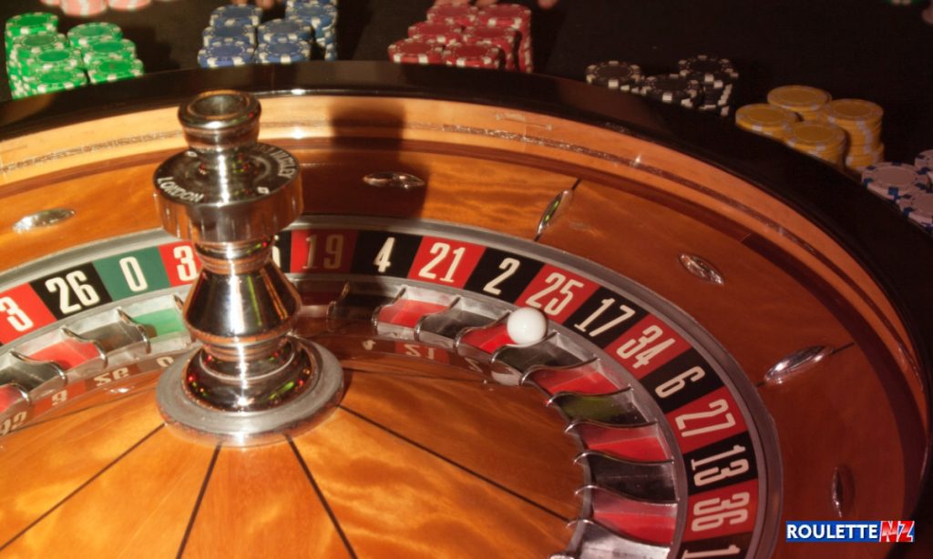 A roulette wheel with the numbers and colors clearly visible, representing the game of roulette and the Andrucci strategy